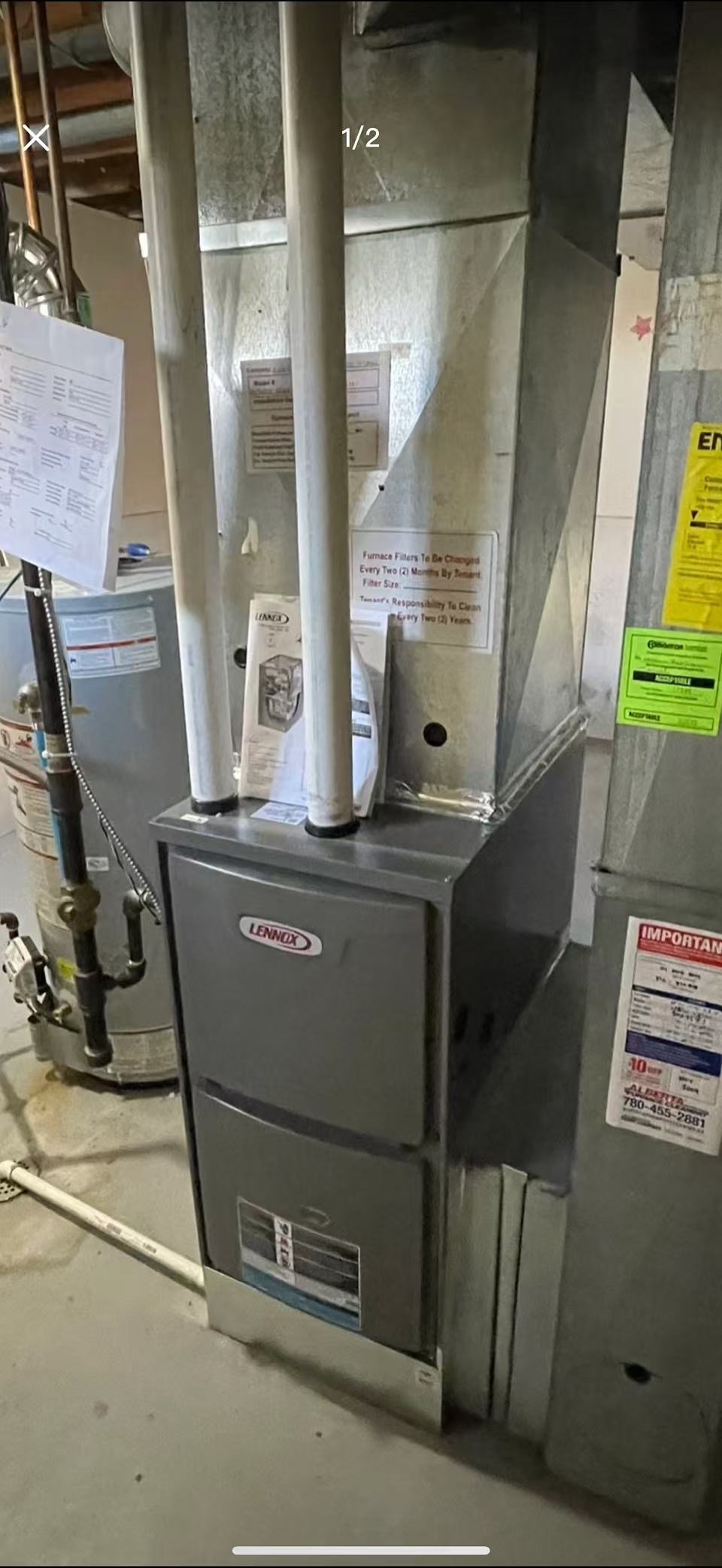 Lennox furnace and ducting installed in mechanical room